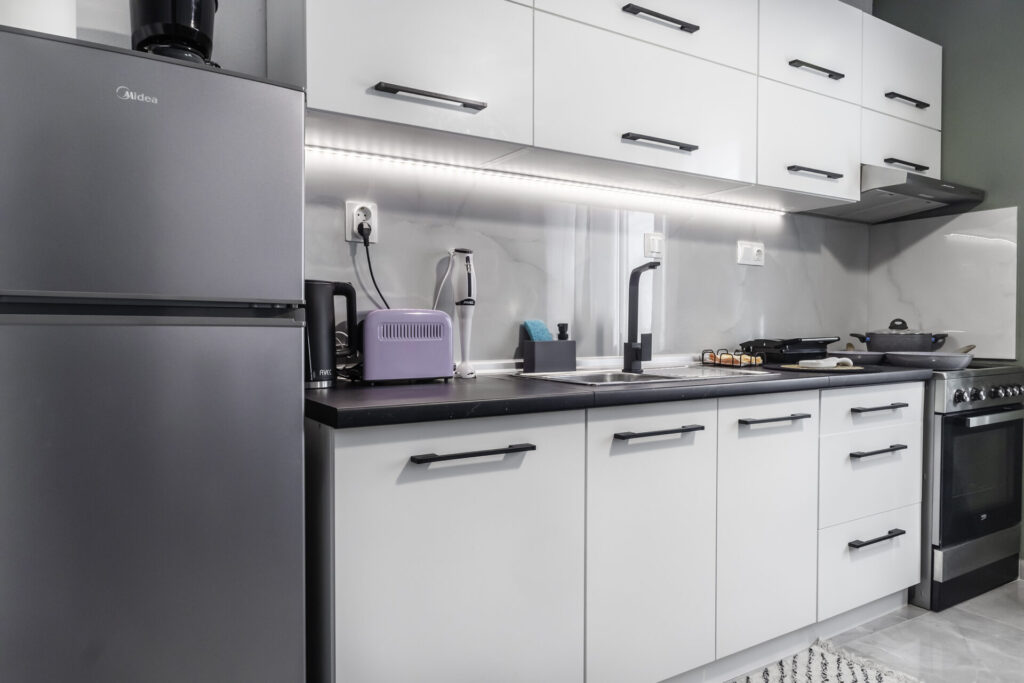 Thassos island Functional Cooking Space in Margio Bay Refrigerator, Stove, and Stylish Cabinets