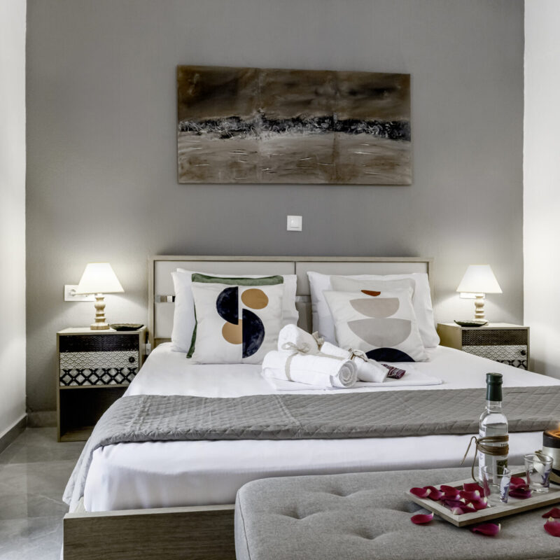 Elegant Sleeping Space at apartment Soft Bedding, Art, and Romantic Touches